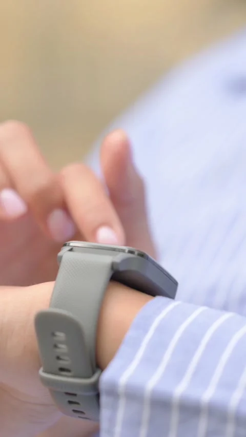 Close up of Hispanic Woman Using Smart Watch Outdoor, vertical Stockbeeldmateriaal 321121856