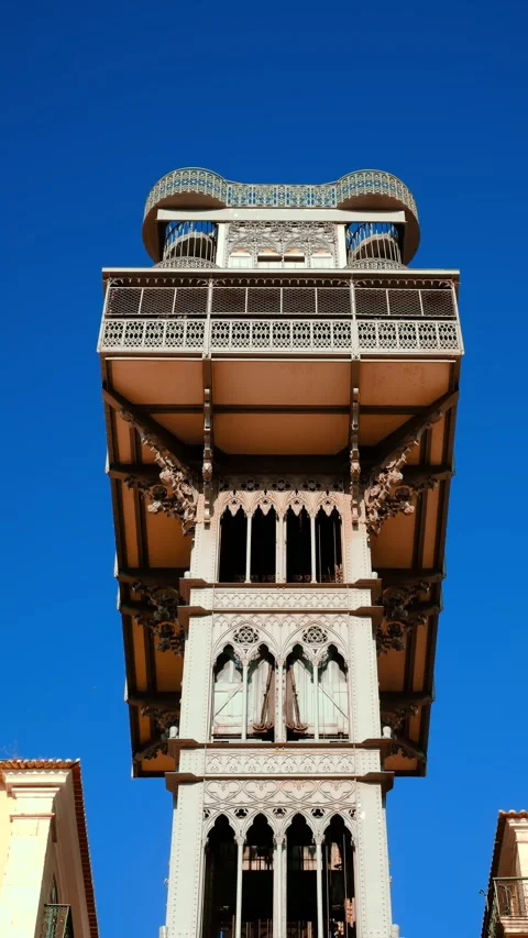 Close-up of historic Santa Justa elevator under blue sky, Lisbon, Portugal Stock Footage 342702315