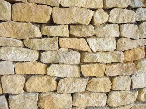 Close up of a historical stone wall texture Stock Photos