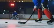 Close-Up Of A Hockey Puck In Slow Motion And A Putter Of Several Pucks In Turn Stock Footage
