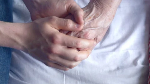Close-up of holding an elderly patient's hand at the hospital Stock Footage 67104482