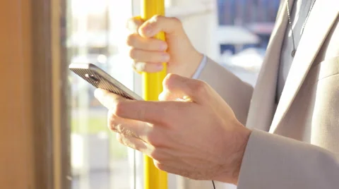 Close-up of holding a smartphone 스톡 동영상 67105049