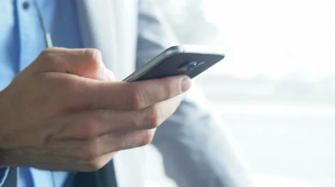 Close-up of holding a smartphone Stock Footage 67105664