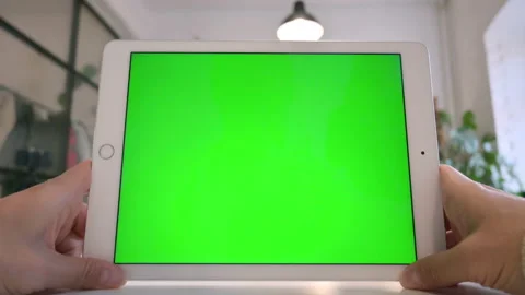 Close Up of Holding Tablet with Chroma Screen Video stock 143564494