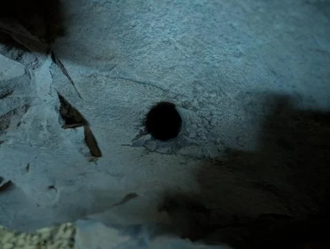 Close-up of a hole in a basalt wall left by tunnel borings at the Wanda min.. Stock Photos