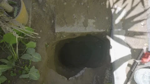 Close-up of a hole made in a garden in the daytime in 4K 動画素材 150668648