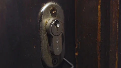 Close up home invader picking a lock Stock Footage 123959513