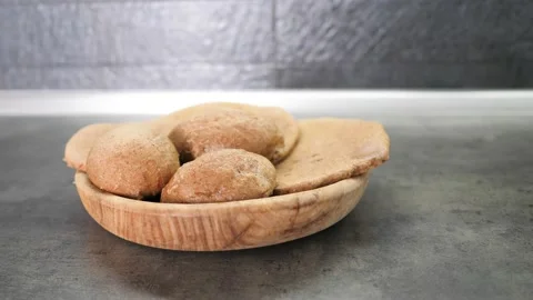 Close up homemade peasant bread made of buckwheat and rye with no yeast. Top Stock Footage 151983093