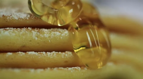 Close up, Honey dripping down a pancake stack Stock Footage 51414940