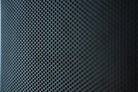 Close-Up of a Honeycomb Patterned Speaker Grill Highlighting Mesh Textures .. Stock Photos