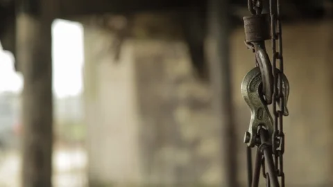 Close up on a hook and chain dangling Florida Stock Footage 90930512