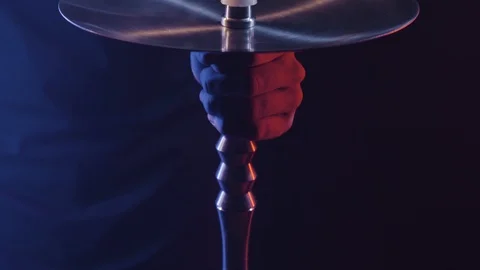 Close-up of hookah details on black background. Action. Man twists details of Video stock 109589887