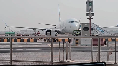A close-up horizontal eye-level daylight stock photo of a commercial airplane 스톡 동영상 315310714