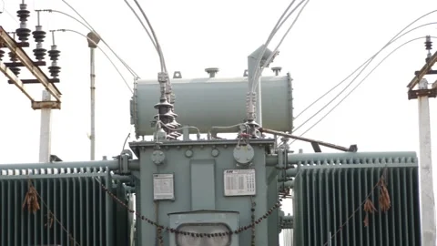 Close horizontal view of a large transformer at power station Video stock 147859179