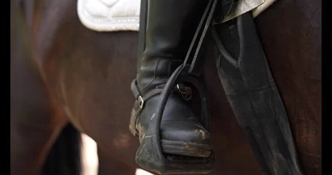 Close Up of a Horse Riders Riding Boot With a Spur on, in the Stirrup Stock Footage 341732837