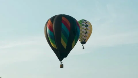 Close up of hot air balloon as it moves through the sky Stock Footage 239046108