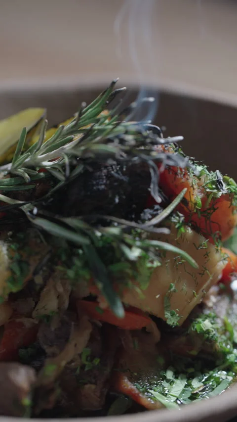 Close up of hot beef stew and rosemary Stock Footage 325004618