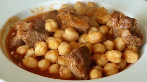 Close-up hot chickpea dish with meat, chickpea dish in plate, Stock Footage 166402813