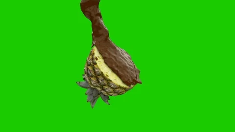 Close up of hot chocolate splash on half pineaple green screen Stock Footage 108900800