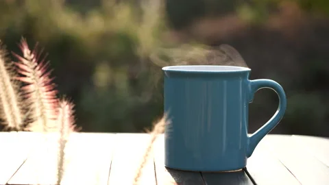 Close up hot coffee cup or tea with steaming smoke. Stock Footage 152480785