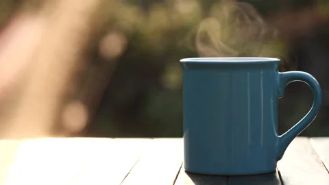 Close up hot coffee cup or tea with steaming smoke. Stock Footage 152480833