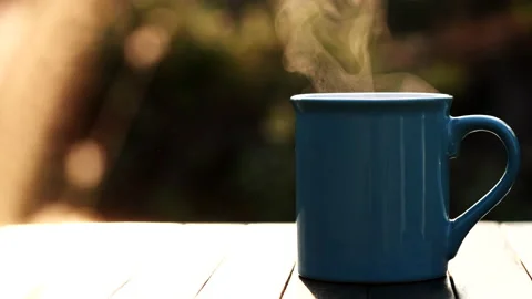 Close up hot coffee cup or tea with steaming smoke. Stock Footage 152494868