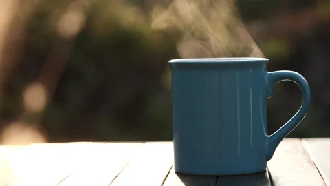 Close up hot coffee cup or tea with steaming smoke. Stock Footage 152494925