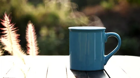Close up hot coffee cup or tea with steaming smoke. Stock Footage 152494927