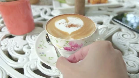 Close up hot coffee cup on a plate. Stock Footage 134909799