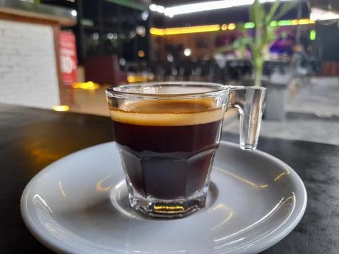 Close-Up of Hot Double Espresso with Perfect Crema on a Dark Table Stock Photos