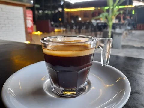 Close-Up of Hot Double Espresso with Perfect Crema on a Dark Table Stock Photos