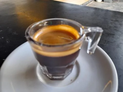 Close-Up of Hot Double Espresso with Perfect Crema on a Dark Table Stock Photos