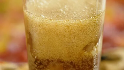 Close-up, hot fresh pepperoni pizza and a glass of cola with ice cubes. Stock Footage 246712339