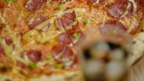 Close-up, hot fresh pepperoni pizza and a glass of cola with ice cubes. Stock Footage 246712341