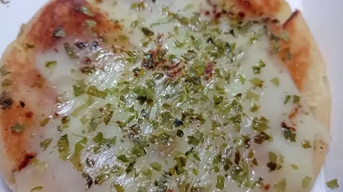 Close-up of Hot Pizza Slice with Melting Mozzarella Cheese Pull Stock Footage 332175998
