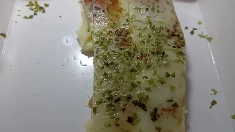 Close-up of Hot Pizza Slice with Melting Mozzarella Cheese Pull Stock Footage 332176000