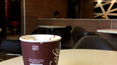 Close up hot sign on Mccafe coffee at mcdonalds fast food restaurant Stock Footage 67522726