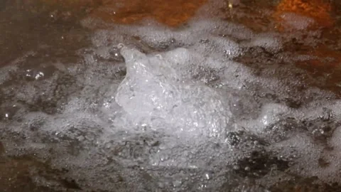 Close up of hot spring bubbles containing sulfur Stock Footage 292932111