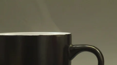 Close up of hot steaming cup of tea Stock Footage 80375251