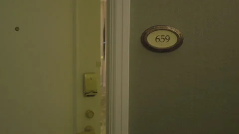 Close-Up of Hotel Door Closing Stock Footage 141078344