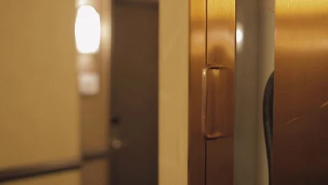 Close up hotel fire extinguisher in case Stock-Footage 122399519