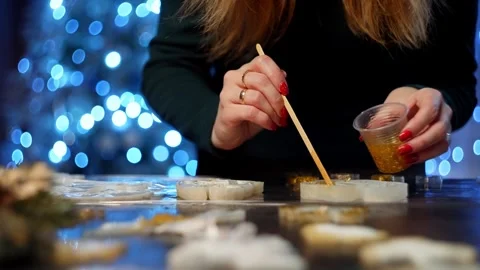 Close-up of how epoxy resin is applied to the mold with a stick. Stock Footage 260692851