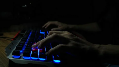 Close up, how Gamer Plays Computer FPS Shooter Video Game  on His Personal Co Stock Footage 151348198