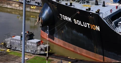 Close Up of a huge ship getting pulled through the Panama Canal Stock Footage 205318682