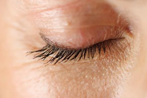 Close-up of human eye with long, dark lashes Stock Photos