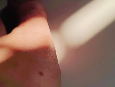 A close up of a human foot with light effect on it showing the texture of t.. Foto stock