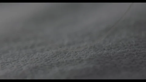 Close up of human hair on fabric. Stock Footage 130831783