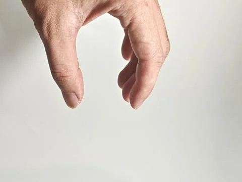 Close-up of Human Hand Gesturing on Clean Neutral Background Stock Photos