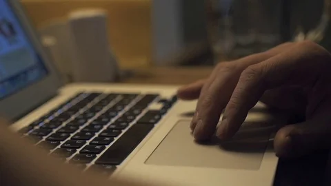 Close up of human hand with laptop in cafe Stock Footage 73288420