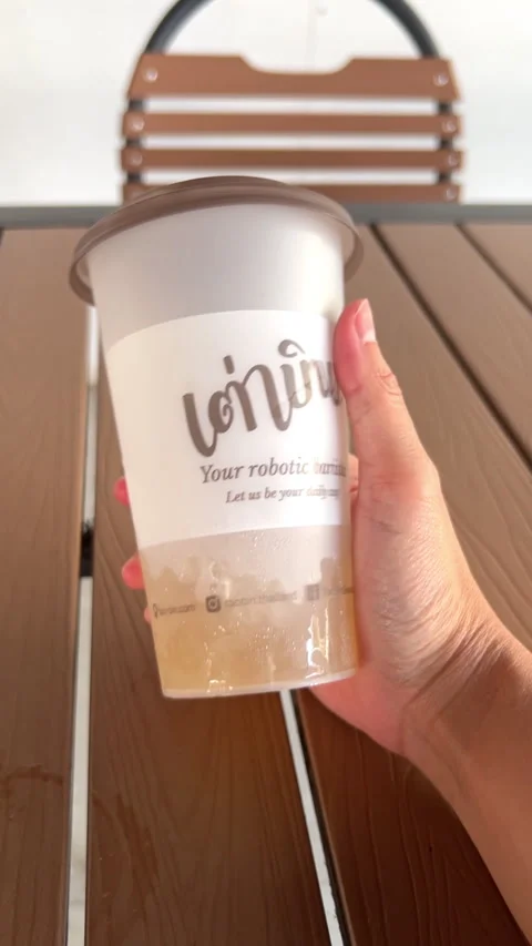 Close Up of Human Hand Reaching to Take Coffee Cup , 19 May 2026 , Thailand. Vídeo Stock 331663453